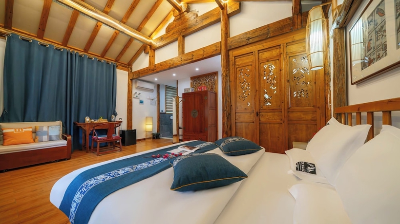 Imagen de la habitación del Hotel Tiger Leaping Gorge yachajiao Manor. Foto 4