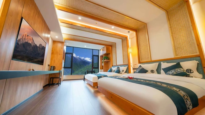 Imagen de la habitación del Hotel Tiger Leaping Gorge yachajiao Manor. Foto 6