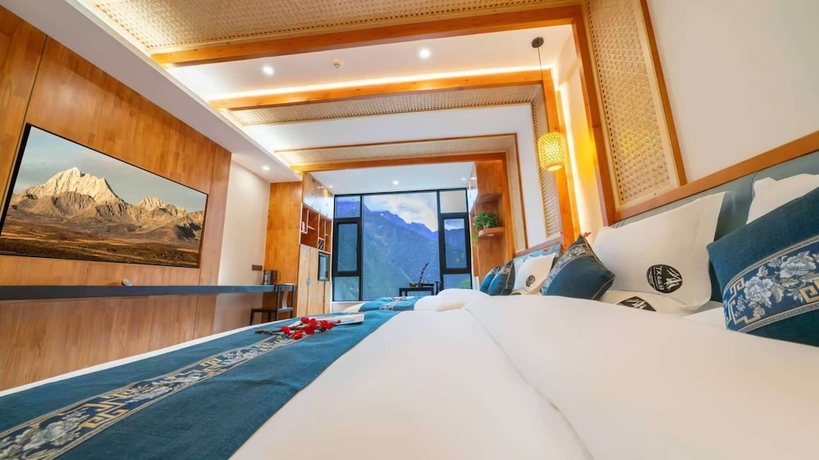 Imagen de la habitación del Hotel Tiger Leaping Gorge yachajiao Manor. Foto 7