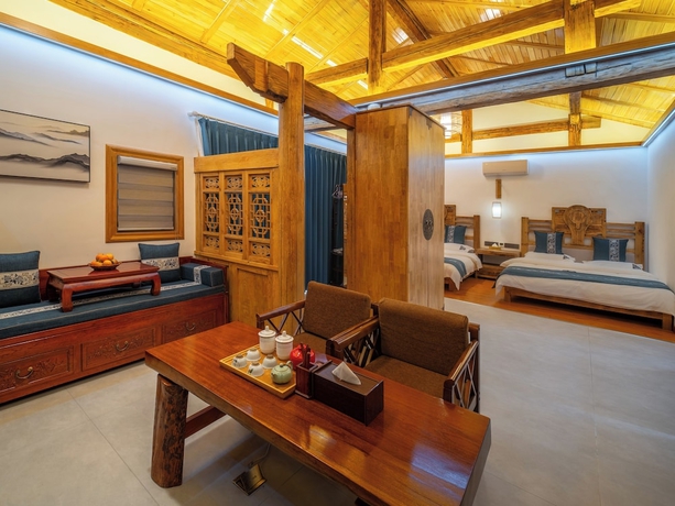 Imagen de la habitación del Hotel Tiger Leaping Gorge yachajiao Manor. Foto 8