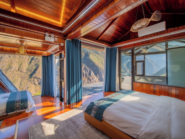 Imagen de la habitación del Hotel Tiger Leaping Gorge yachajiao Manor. Foto 10