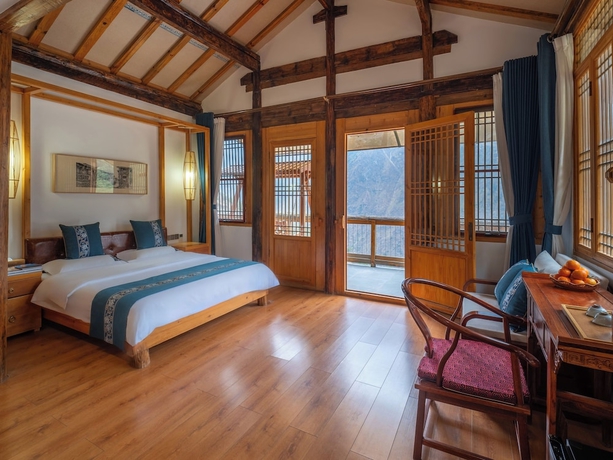 Imagen de la habitación del Hotel Tiger Leaping Gorge yachajiao Manor. Foto 12