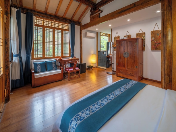 Imagen de la habitación del Hotel Tiger Leaping Gorge yachajiao Manor. Foto 13