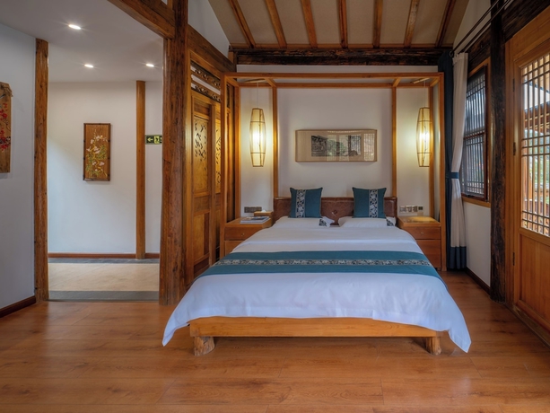 Imagen de la habitación del Hotel Tiger Leaping Gorge yachajiao Manor. Foto 14