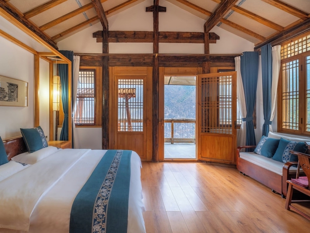 Imagen de la habitación del Hotel Tiger Leaping Gorge yachajiao Manor. Foto 15