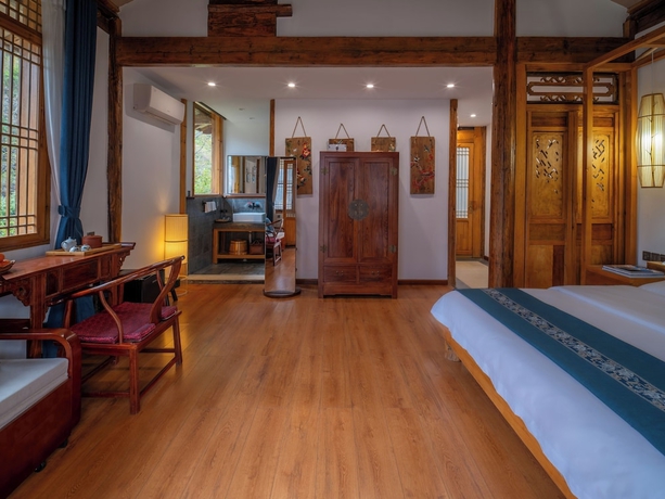 Imagen de la habitación del Hotel Tiger Leaping Gorge yachajiao Manor. Foto 16