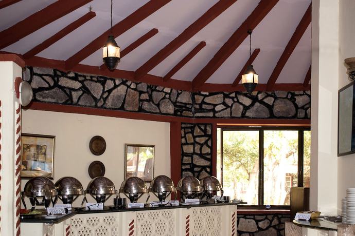 Imagen del bar/restaurante del Hotel Tiger Moon Resort. Foto 4