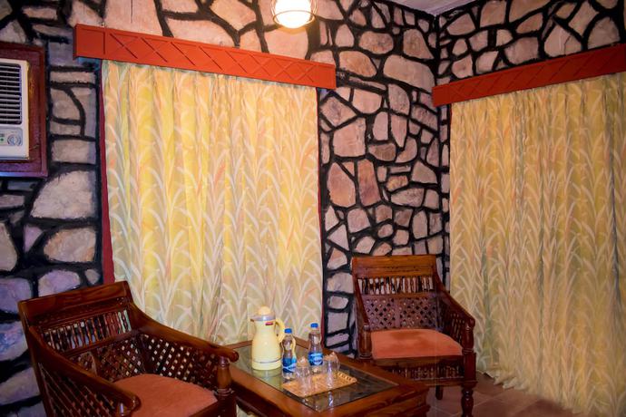 Imagen de la habitación del Hotel Tiger Moon Resort. Foto 10