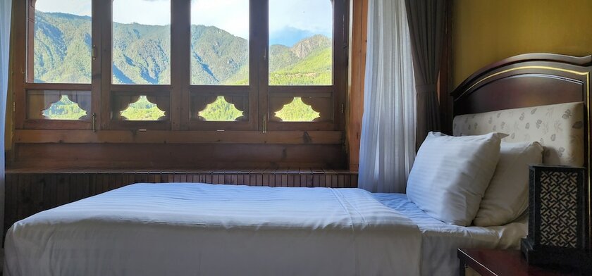 Imagen de la habitación del Hotel Tiger Nest Resort. Foto 16