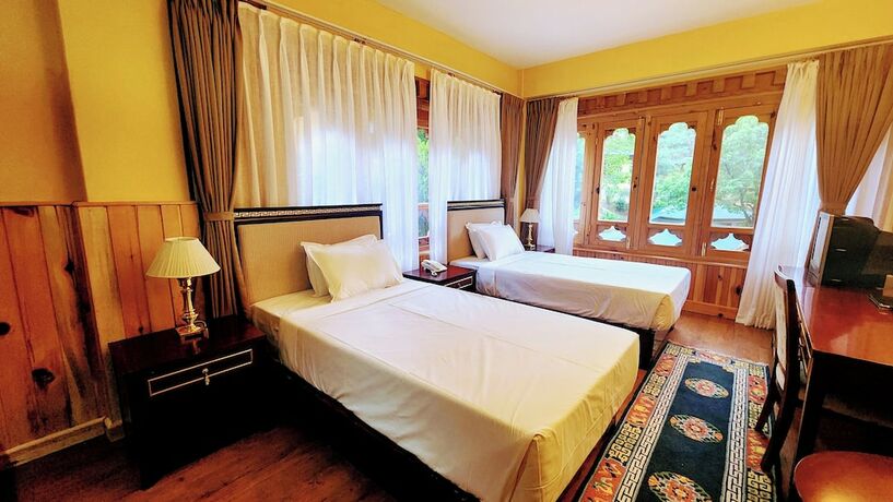 Imagen de la habitación del Hotel Tiger Nest Resort. Foto 19