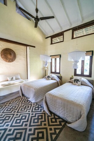 Imagen de la habitación del Hotel Tigertops Karnali Lodge. Foto 17