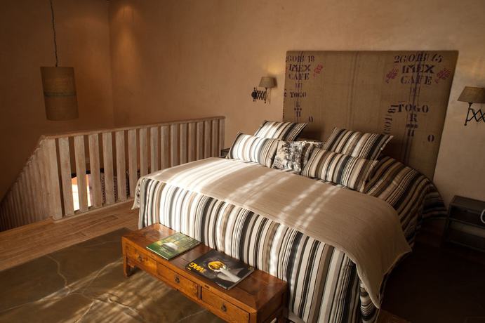 Imagen de la habitación del Hotel Tigmiza Suites and Pavillions. Foto 4