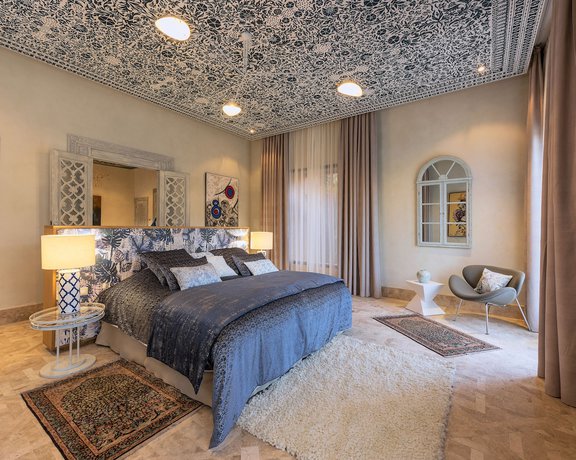 Imagen de la habitación del Hotel Tigmiza Suites and Pavillions. Foto 6