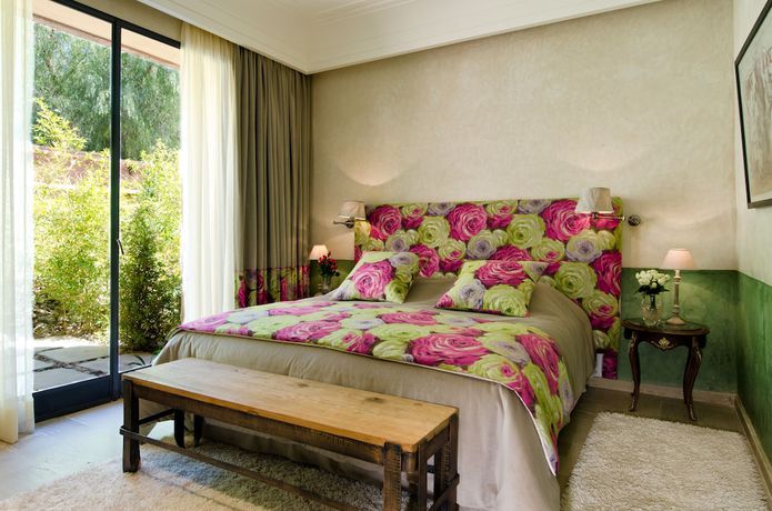 Imagen de la habitación del Hotel Tigmiza Suites and Pavillions. Foto 10