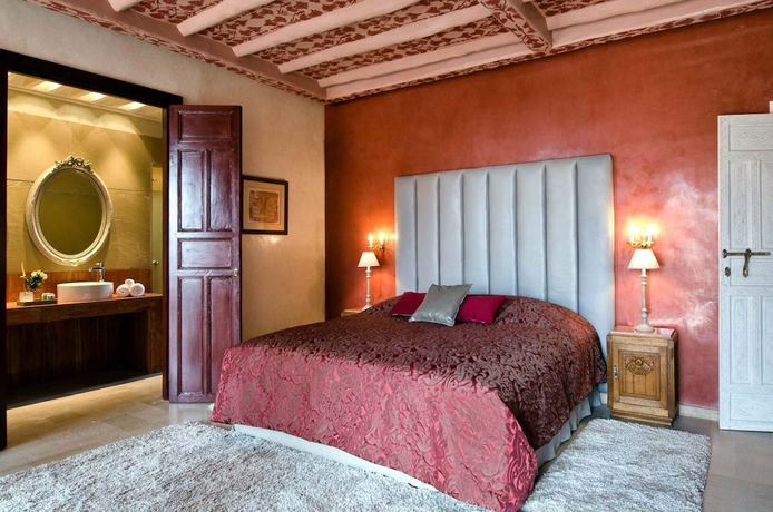 Imagen de la habitación del Hotel Tigmiza Suites and Pavillions. Foto 16