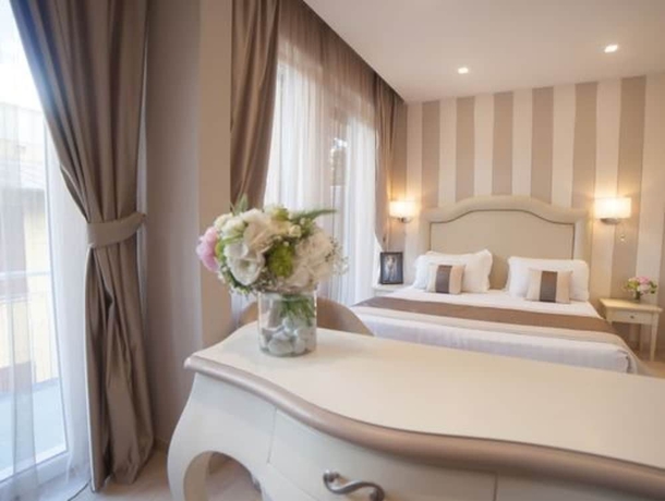 Imagen de la habitación del Hotel Tigullio Et De Milan. Foto 3