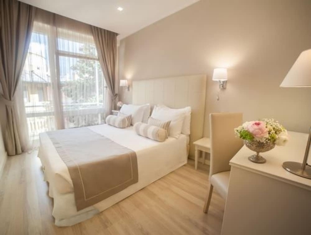 Imagen de la habitación del Hotel Tigullio Et De Milan. Foto 8