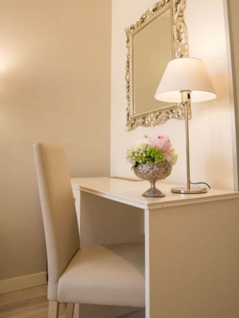 Imagen de la habitación del Hotel Tigullio Et De Milan. Foto 9