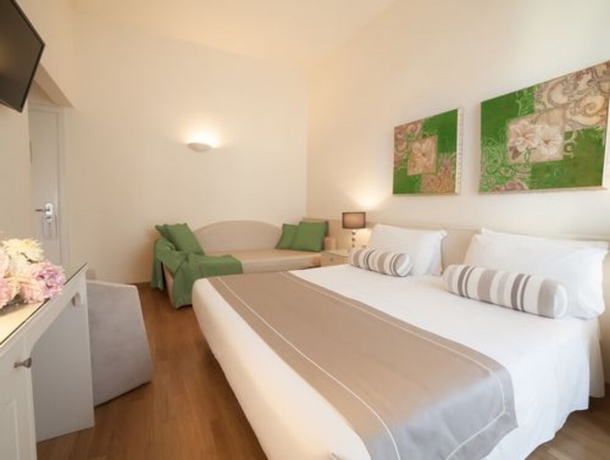 Imagen de la habitación del Hotel Tigullio Et De Milan. Foto 10