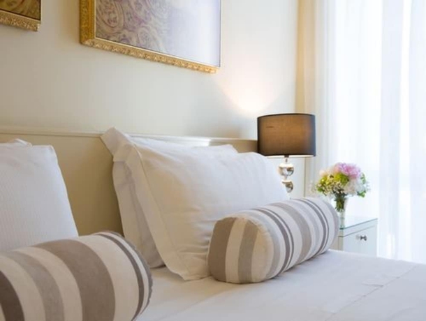 Imagen de la habitación del Hotel Tigullio Et De Milan. Foto 11