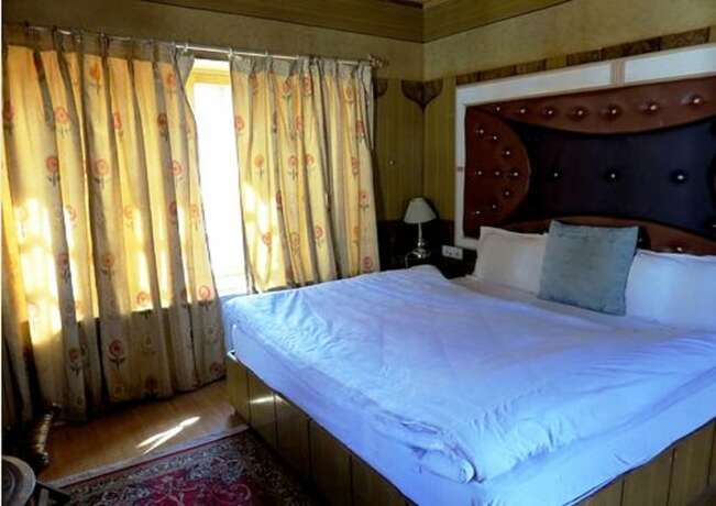 Imagen de la habitación del Hotel Tih Nezer Holiday Inn. Foto 19