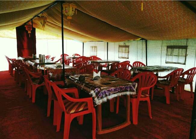 Imagen del bar/restaurante del Hotel Tih Pangong Delight Camps and Cottages. Foto 21