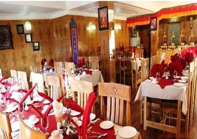 Imagen del bar/restaurante del Hotel Tih Royal Palace. Foto 19