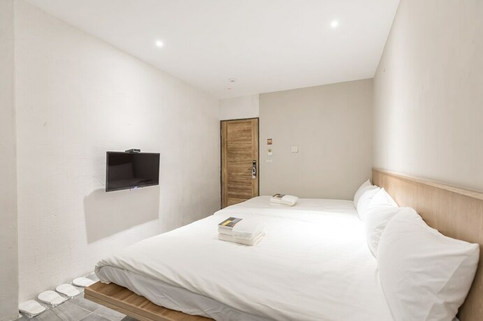 Imagen de la habitación del Hotel Tiin Tinn. Foto 11