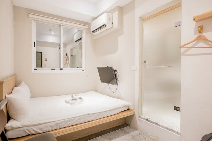 Imagen de la habitación del Hotel Tiin Tinn. Foto 12