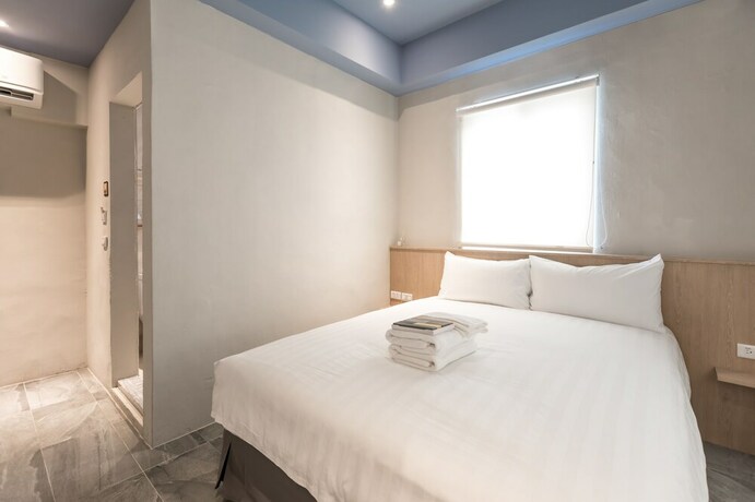 Imagen de la habitación del Hotel Tiin Tinn. Foto 17