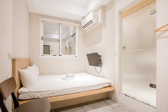 Imagen de la habitación del Hotel Tiin Tinn. Foto 29