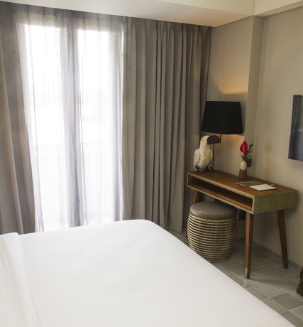 Imagen de la habitación del Hotel Tijili Seminyak. Foto 10