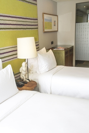 Imagen de la habitación del Hotel Tijili Seminyak. Foto 11