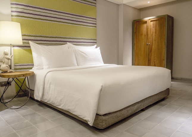 Imagen de la habitación del Hotel Tijili Seminyak. Foto 12