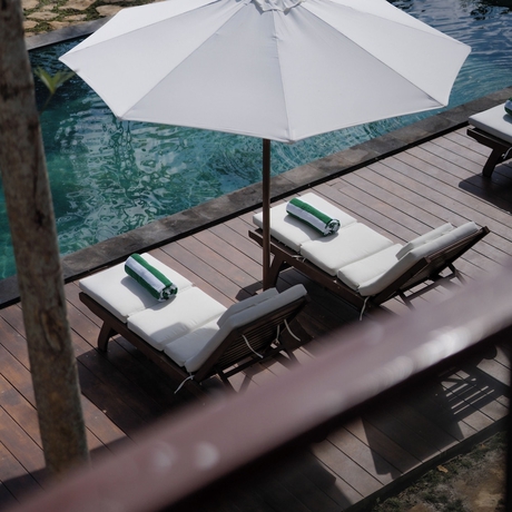 Imagen de la habitación del Hotel Tika Lombok. Foto 8
