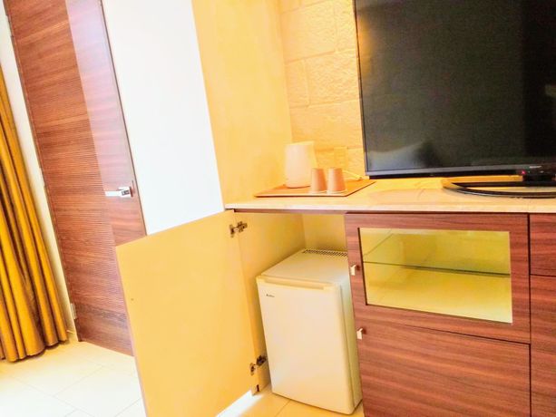 Imagen de la habitación del Hotel Tiki. Foto 14