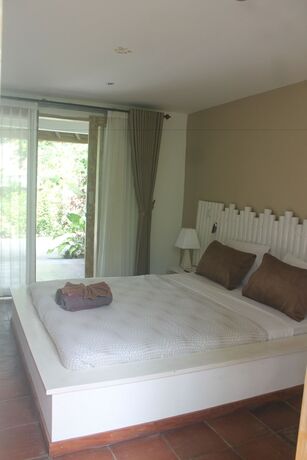 Imagen de la habitación del Hotel Tiki Lodge Lombok. Foto 36