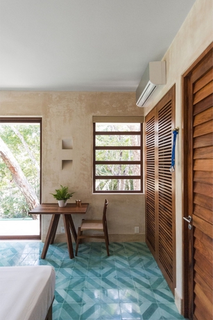 Imagen de la habitación del Hotel Tiki Tiki. Foto 14