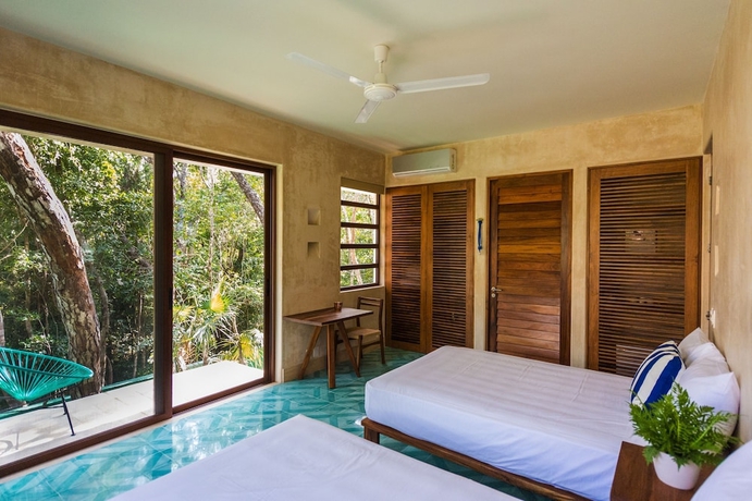 Imagen de la habitación del Hotel Tiki Tiki. Foto 15