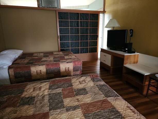 Imagen de la habitación del Hotel Tiki Village. Foto 14