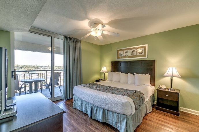 Imagen de la habitación del Hotel Tilghman Beach and Golf Resort by Condo-World. Foto 4