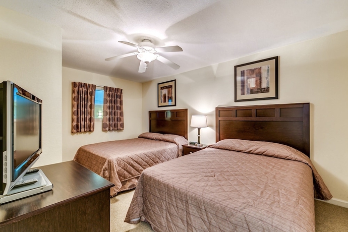 Imagen de la habitación del Hotel Tilghman Beach and Golf Resort by Condo-World. Foto 6