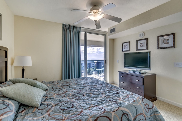 Imagen de la habitación del Hotel Tilghman Beach and Golf Resort by Condo-World. Foto 8