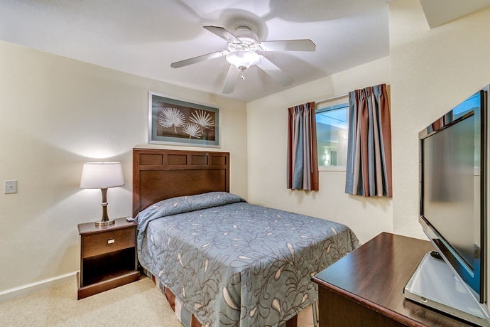 Imagen de la habitación del Hotel Tilghman Beach and Golf Resort by Condo-World. Foto 9