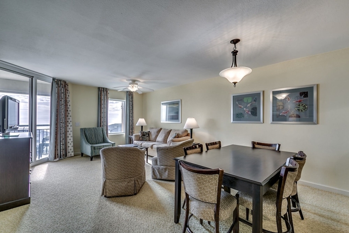 Imagen de la habitación del Hotel Tilghman Beach and Golf Resort by Condo-World. Foto 10