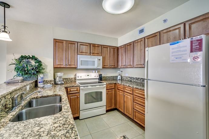 Imagen de la habitación del Hotel Tilghman Beach and Golf Resort by Condo-World. Foto 12