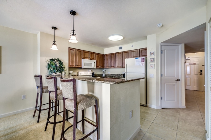 Imagen de la habitación del Hotel Tilghman Beach and Golf Resort by Condo-World. Foto 13