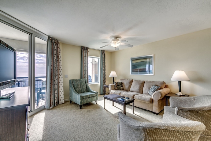 Imagen de la habitación del Hotel Tilghman Beach and Golf Resort by Condo-World. Foto 16