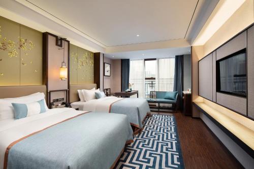 Imagen de la habitación del Hotel Till Bright, Leiyang Zhongxing Times Square. Foto 13