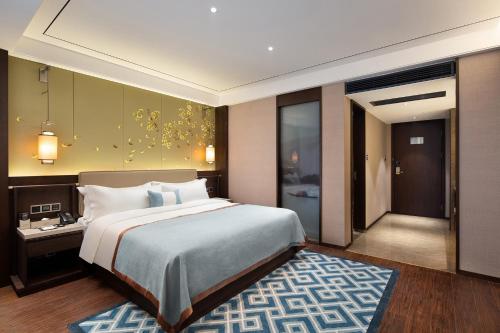 Imagen de la habitación del Hotel Till Bright, Leiyang Zhongxing Times Square. Foto 14
